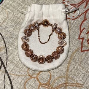 Pandora rose gold bracelet with charms